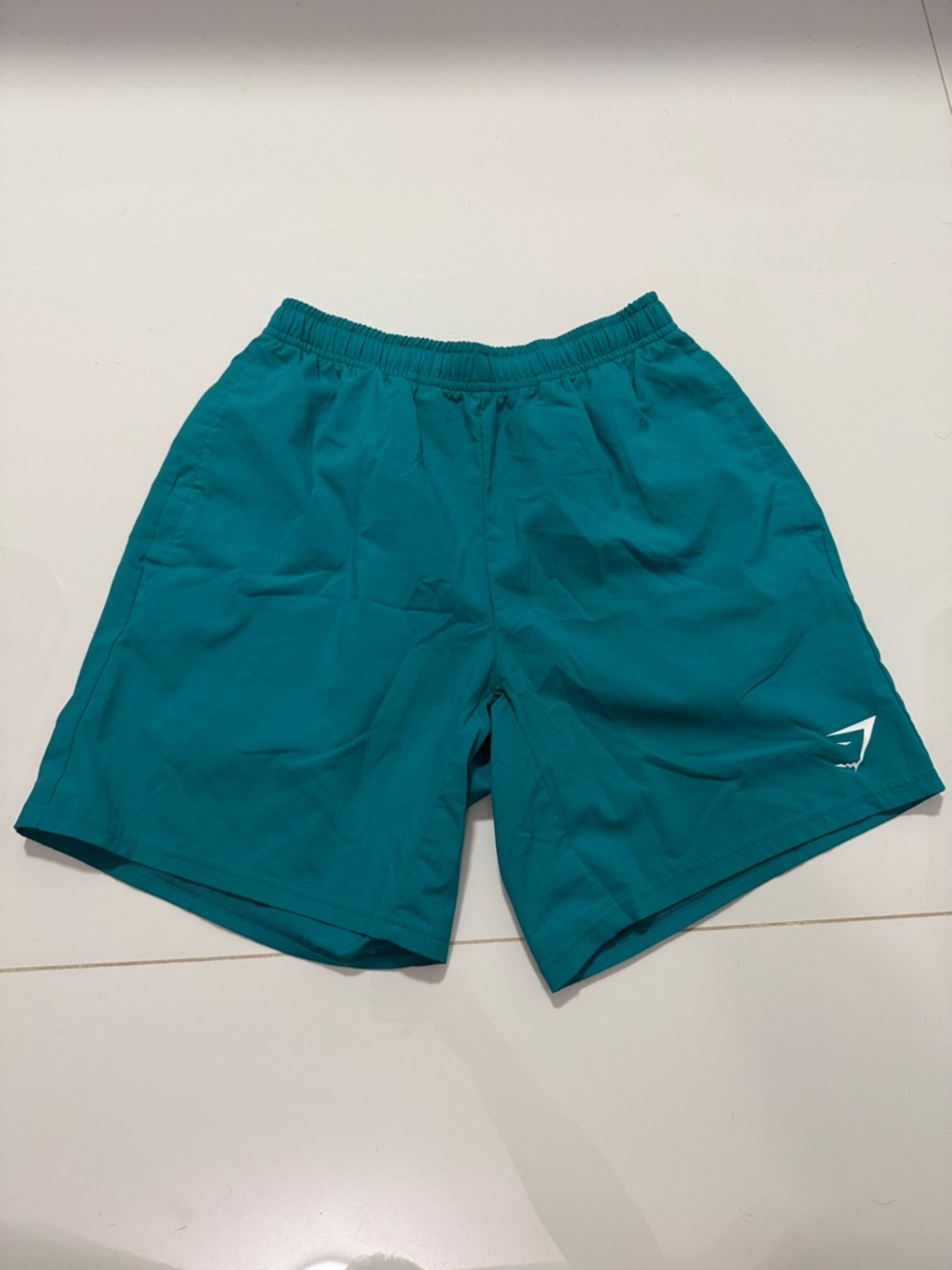 Gymshark Men's Teal Performance Shorts with Logo